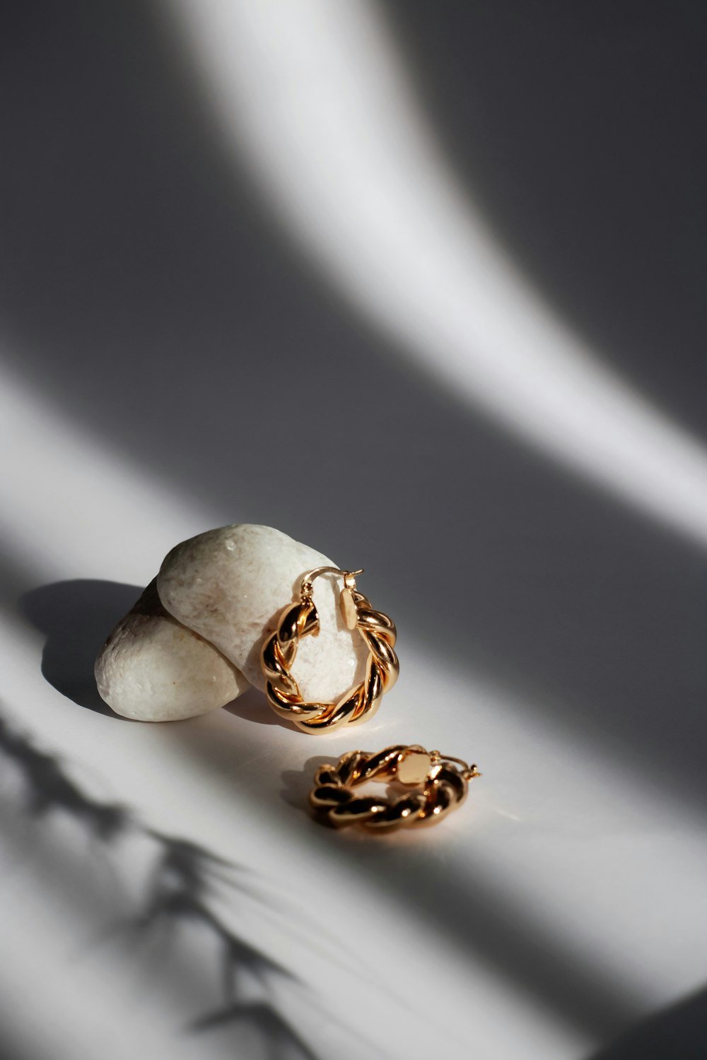 Flat-lay of jewellery on textured surface